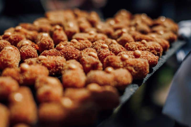 Canapes being served at garden wedding venue