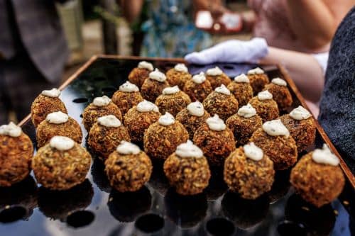 Canapes being served at outdoor wedding venue
