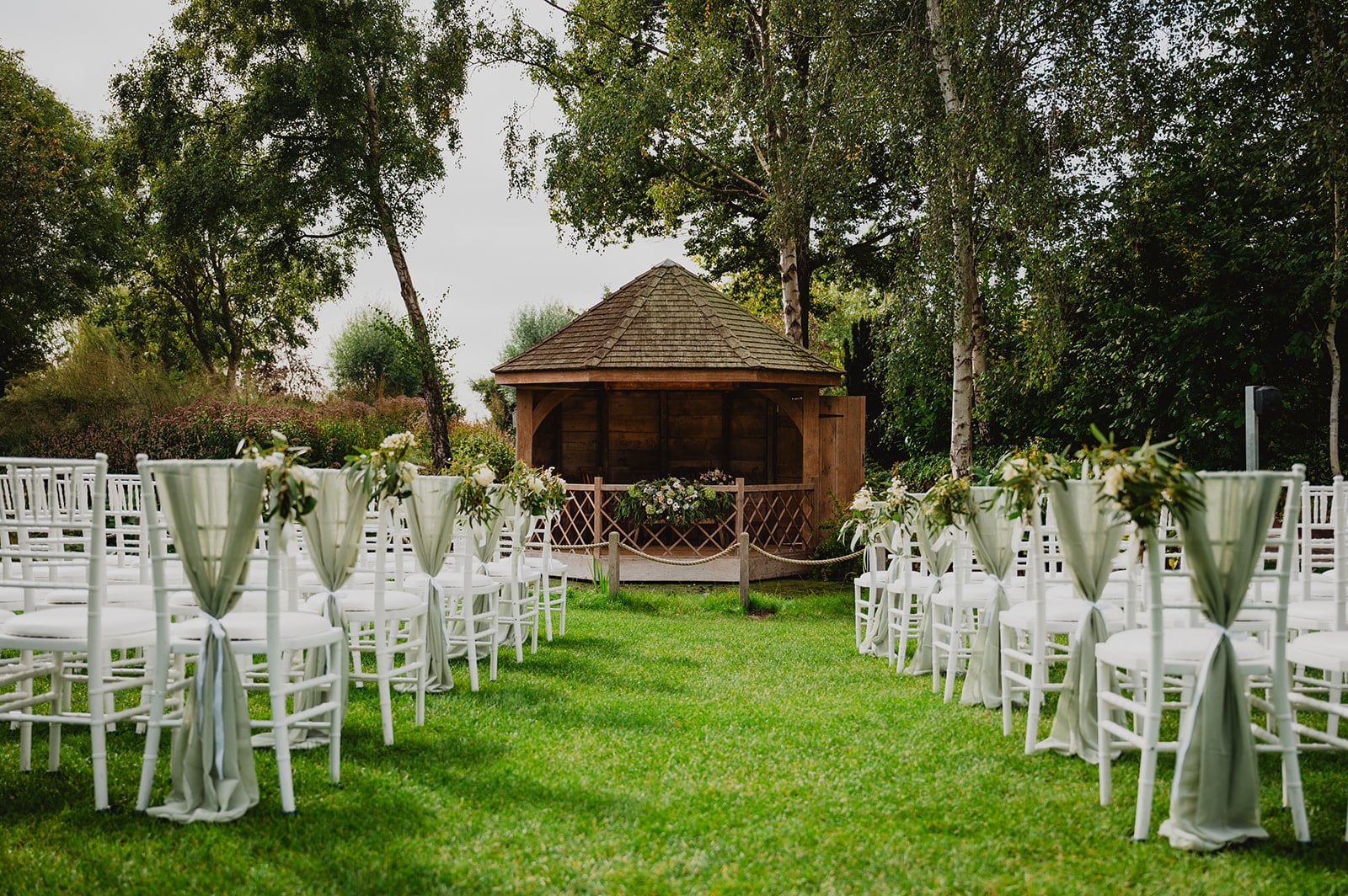 The Summerhouse all set for an outdoor cermony at charming barn wedding venue in Hertfordshire