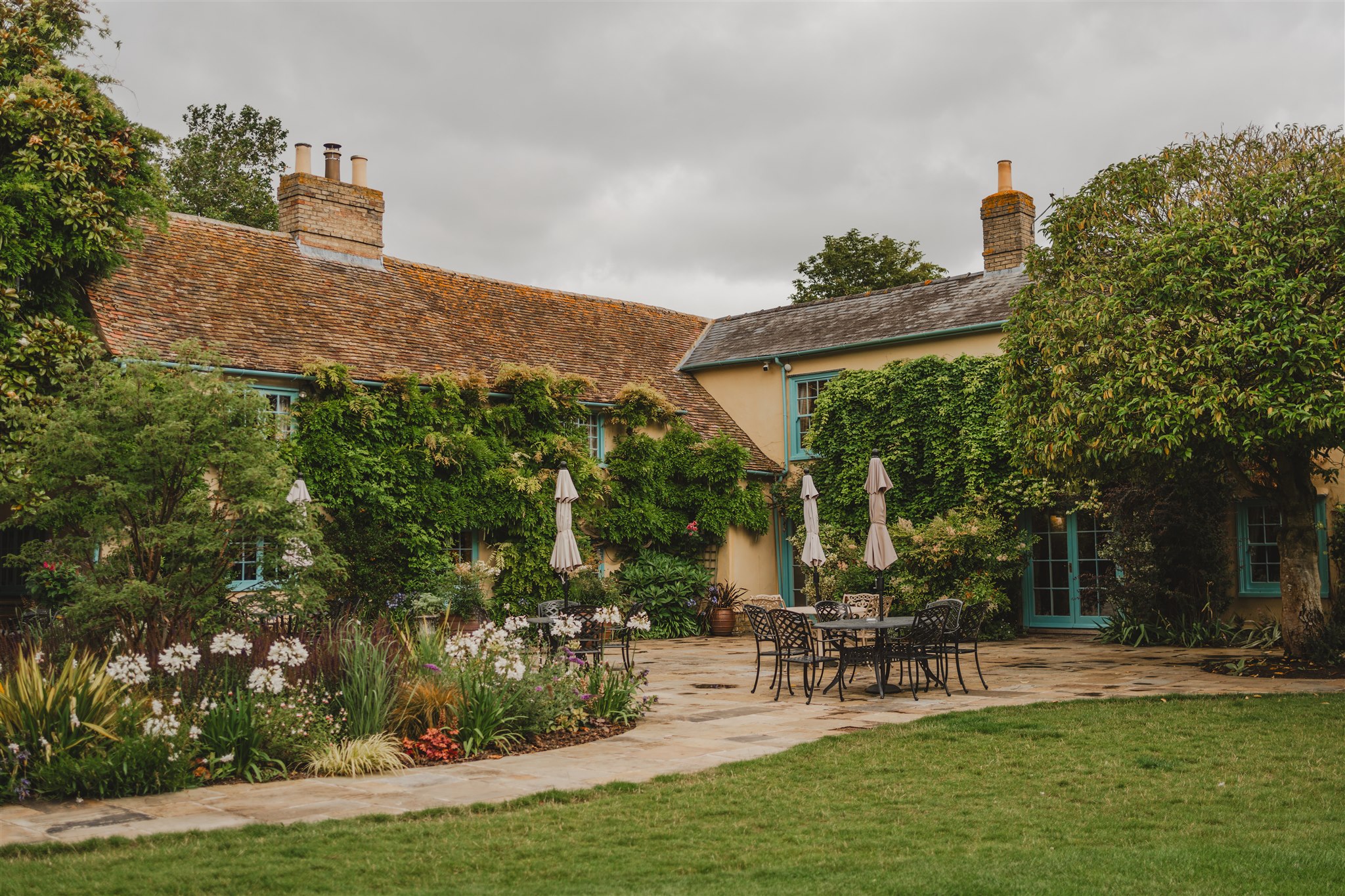 The Garden Terrace with Spring flowers blooming at outdoor wedding venue