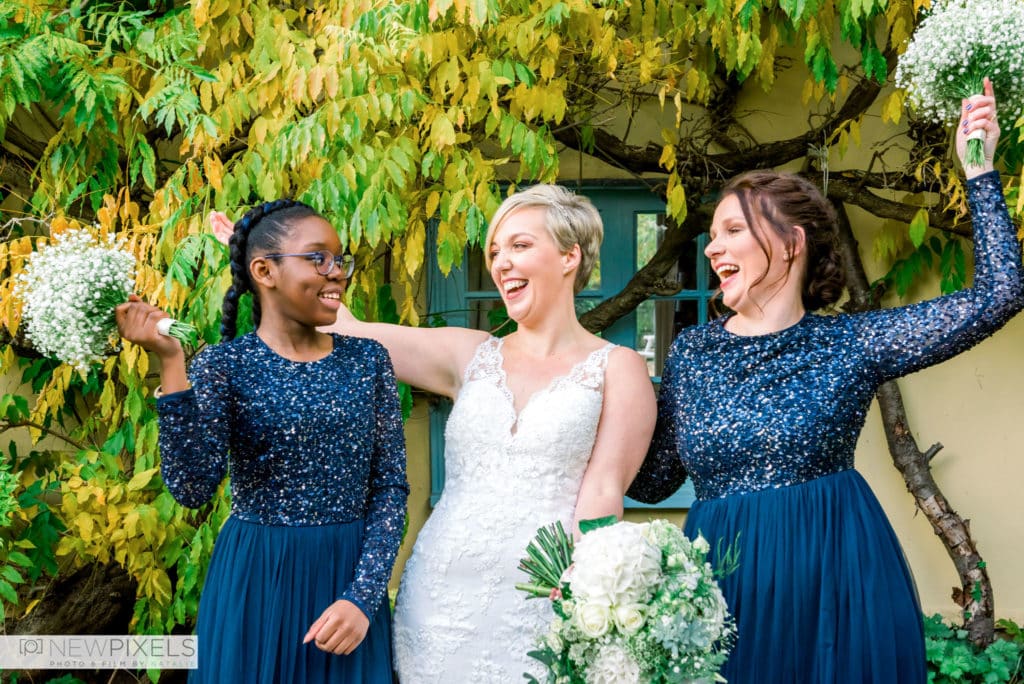 Bride-and-Bridesmaids-at-South-Farm-Cambridgeshire-Wedding-Venue-New-Pixels-Photo-Film-