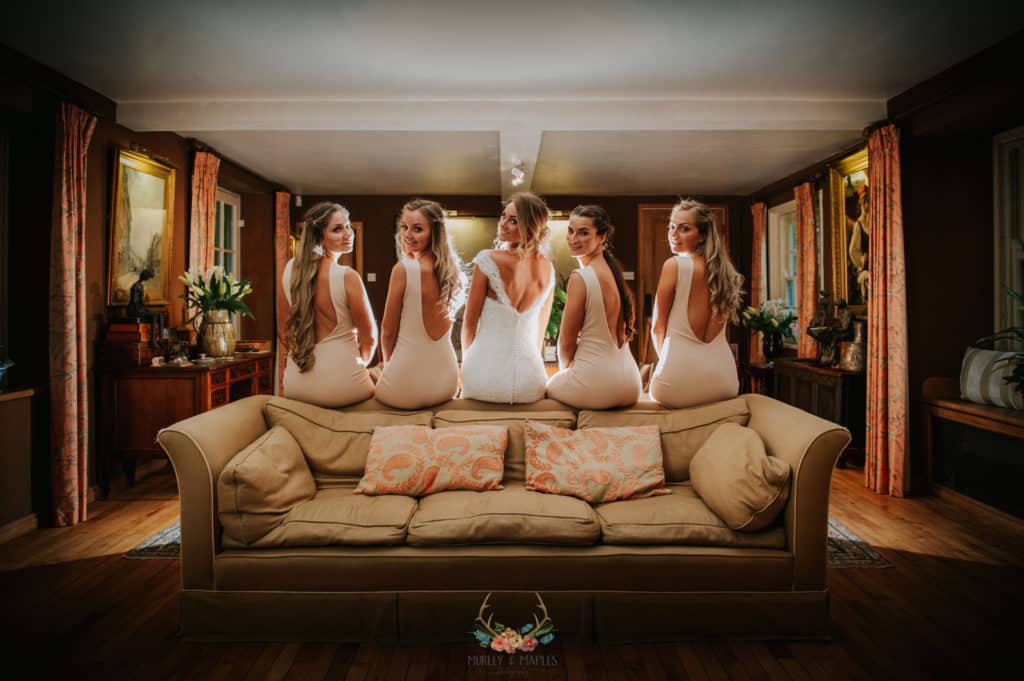 Bride and Bridesmaids in Drawing Room of Country House Wedding Venue