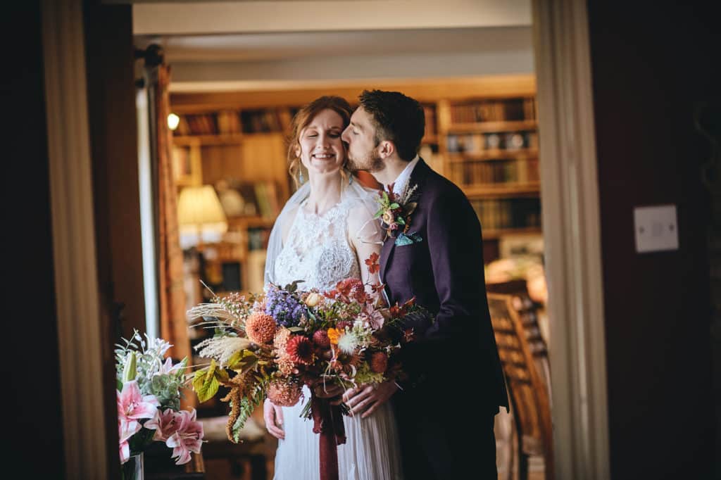 Bride and Groom share a moment at country house wedding venue