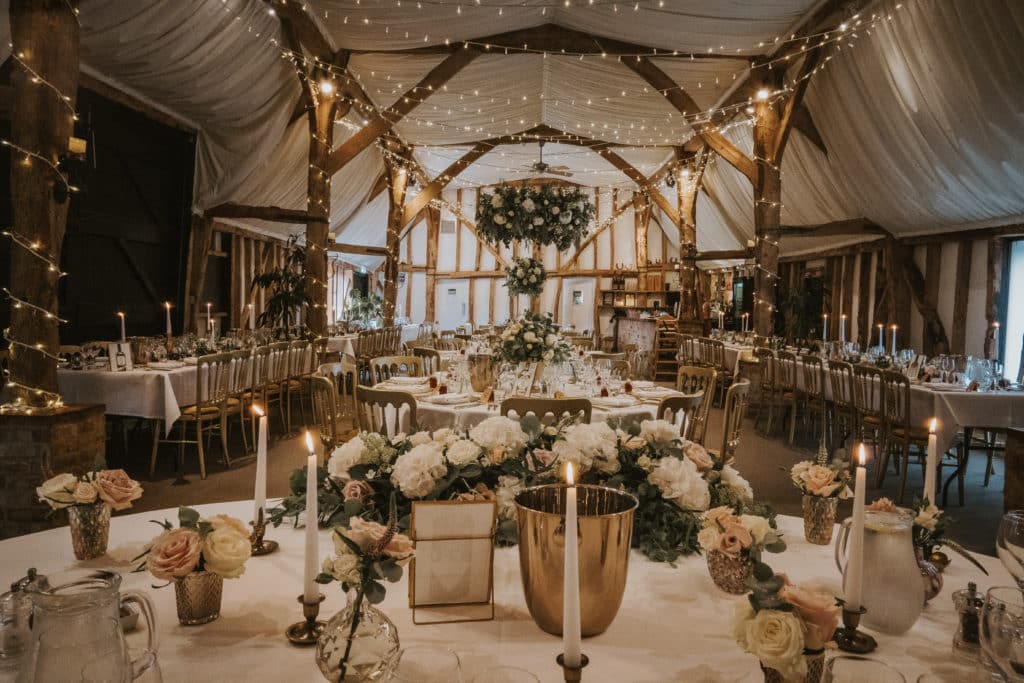South Farm Rustic Wedding Barn with Candlelight set for Wedding Meal