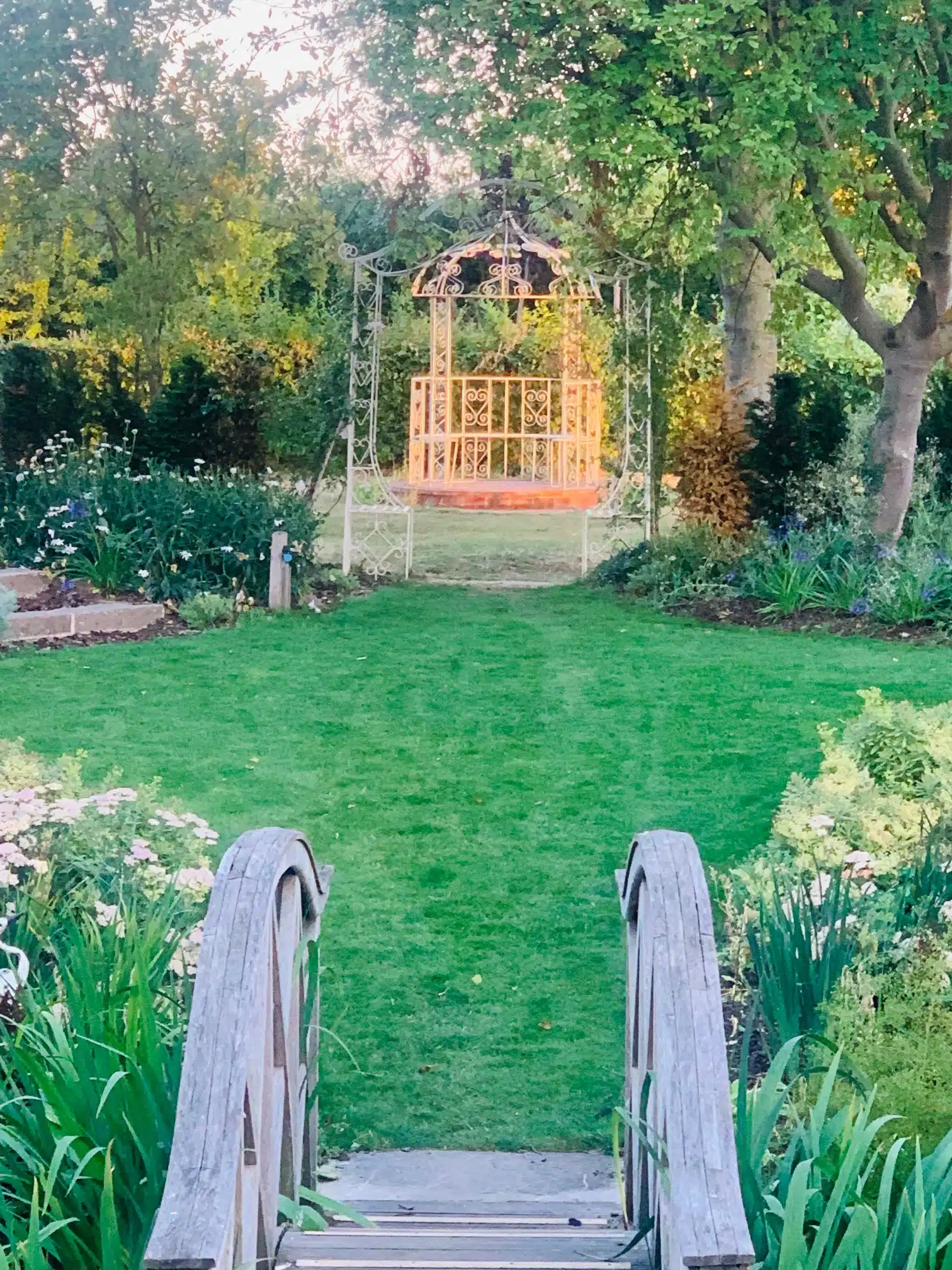 Beautiful Gardens at Sunset Little Pergola over the bridge