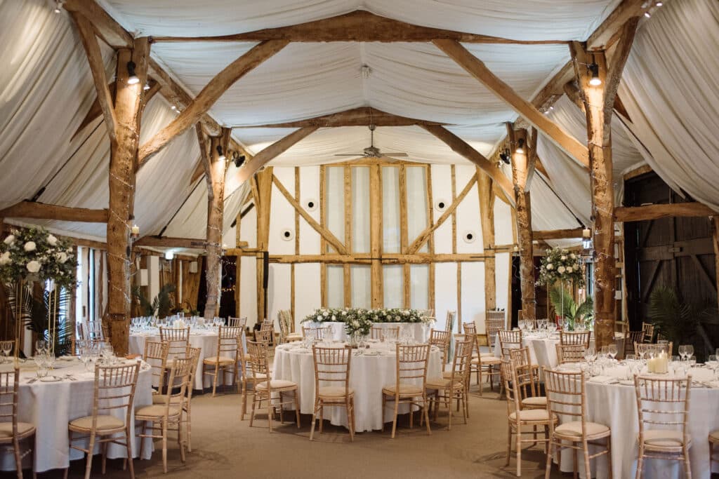 Rustic barn set for wedding meal