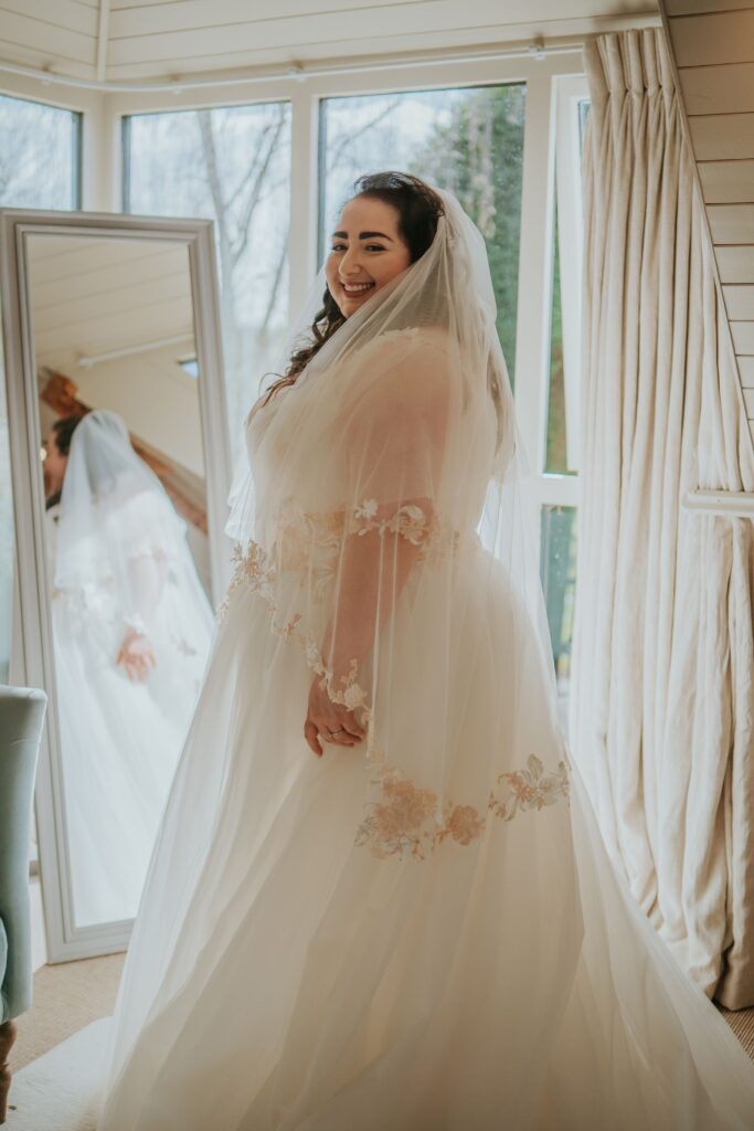 Beautiful Jewish Bride on Wedding day in dress dn veil ready for wedding ceremony 