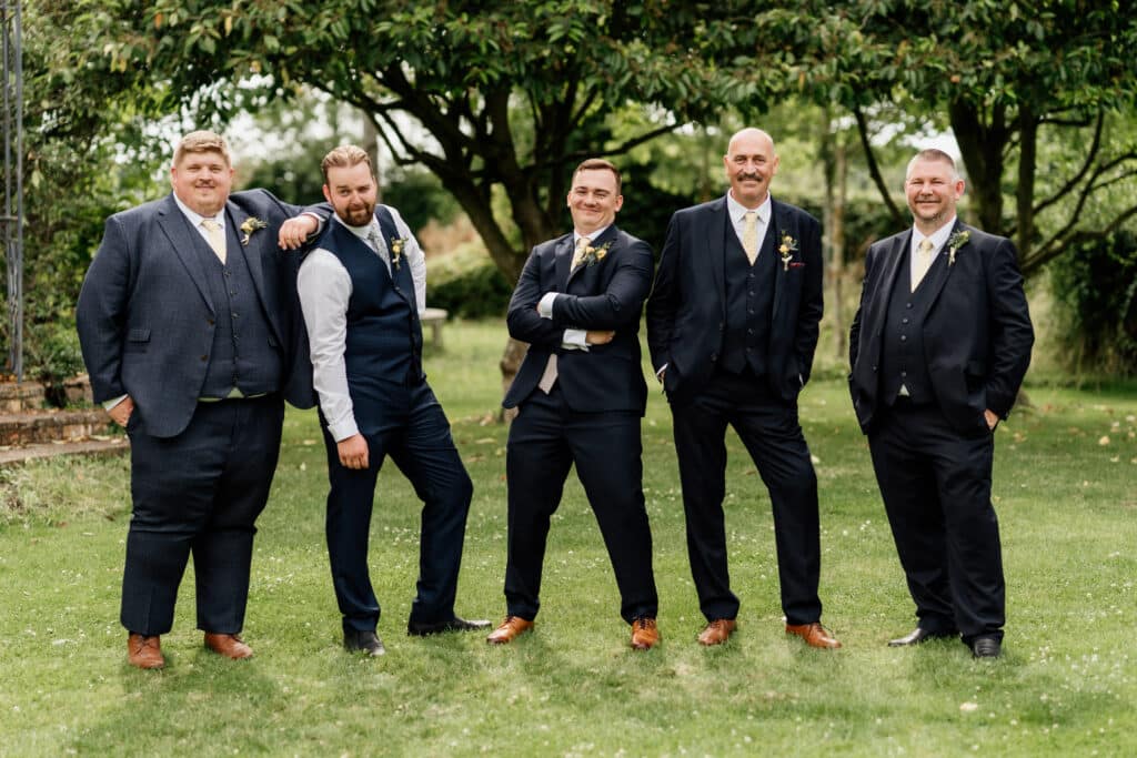 Groom and friends on wedding day