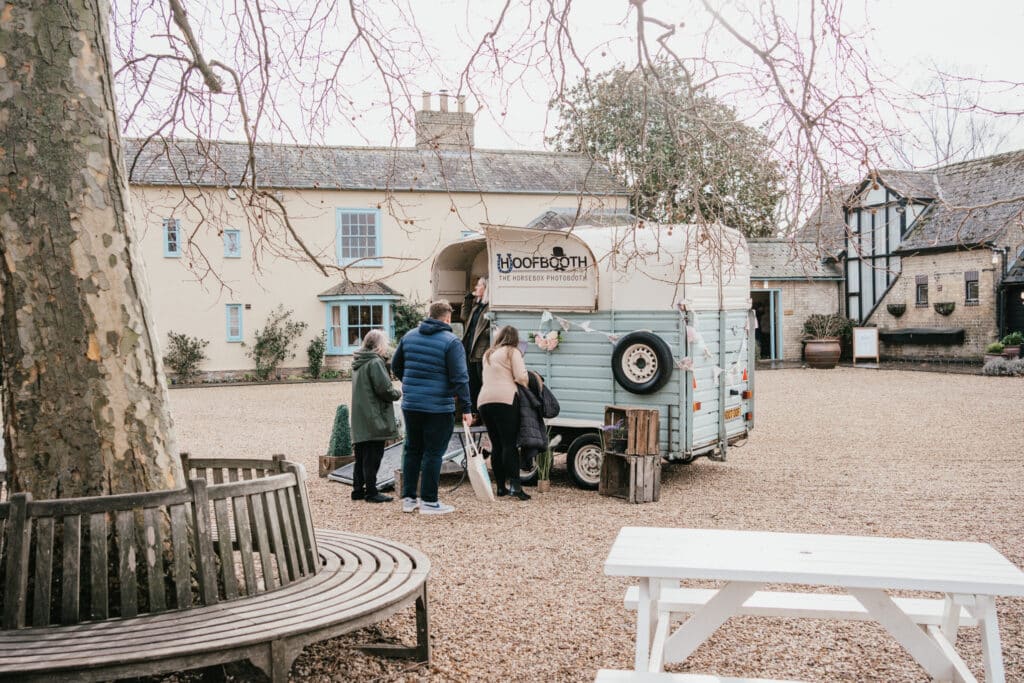 Horsebox photobooth in grounds of countryside wedding venue