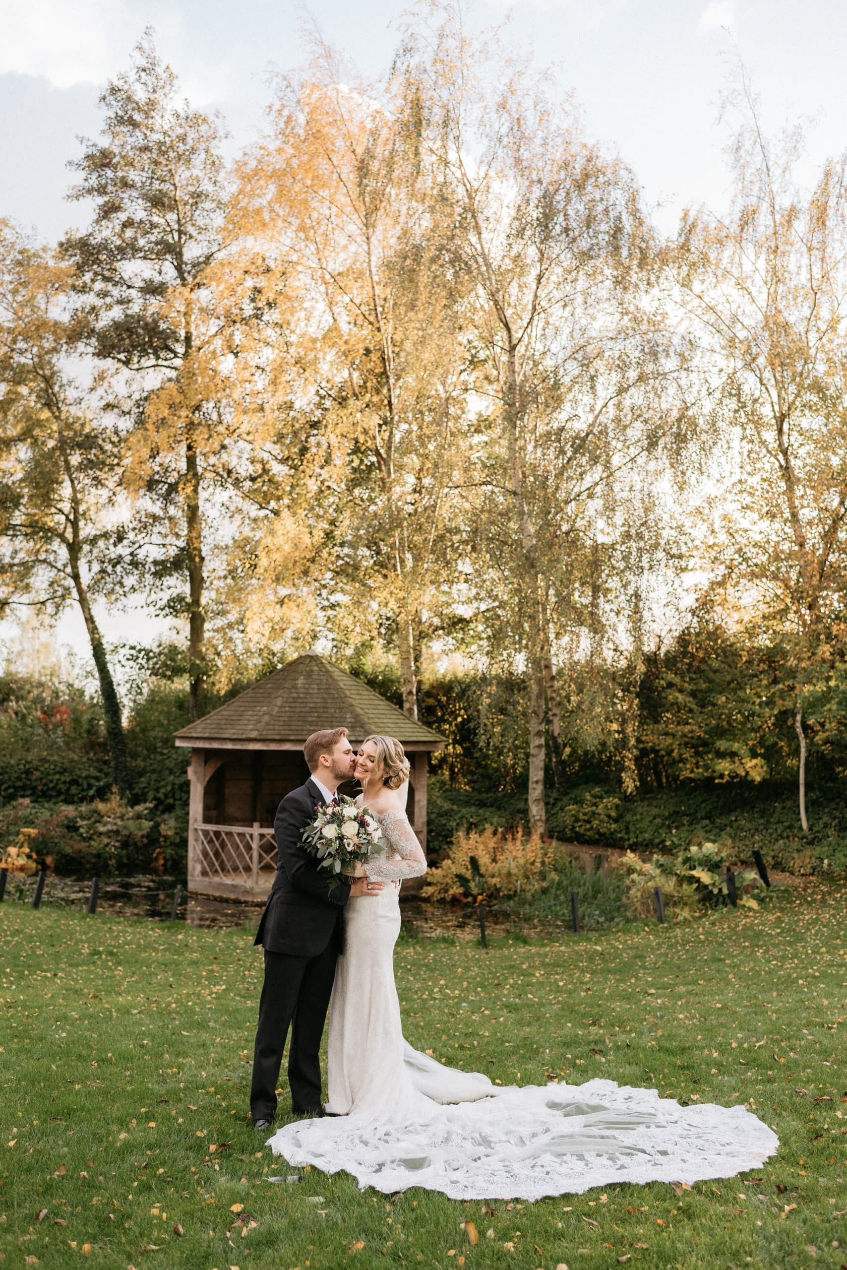Couple in Autumn Garden at Rustic Farm Wedding Venue
