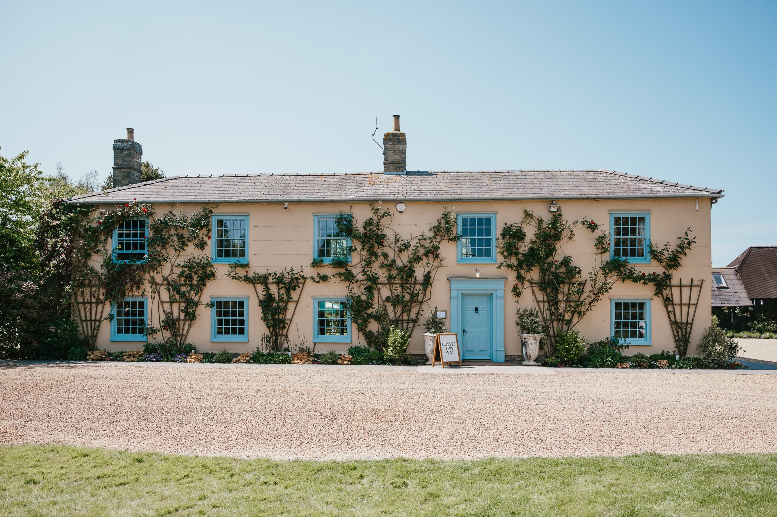 Farmhouse wedding venue on a sunny Spring day