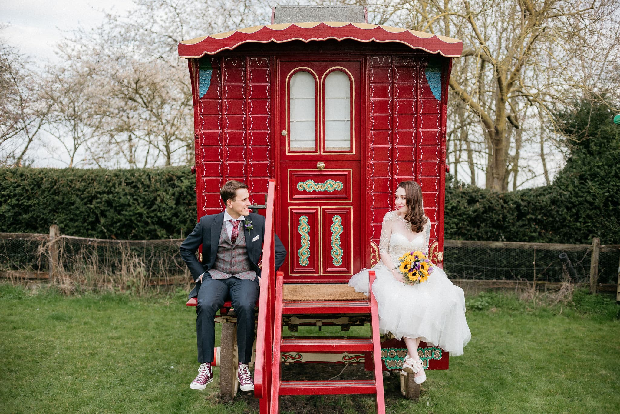 Spring Wedding Bride and Groom Photos at Red Showmans Wagon