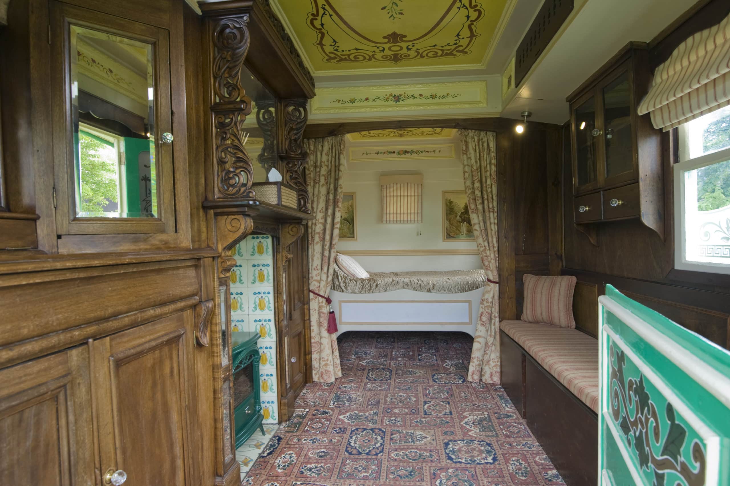 Unique hand painted Romany Wagon interior at South Farm Wedding Venue