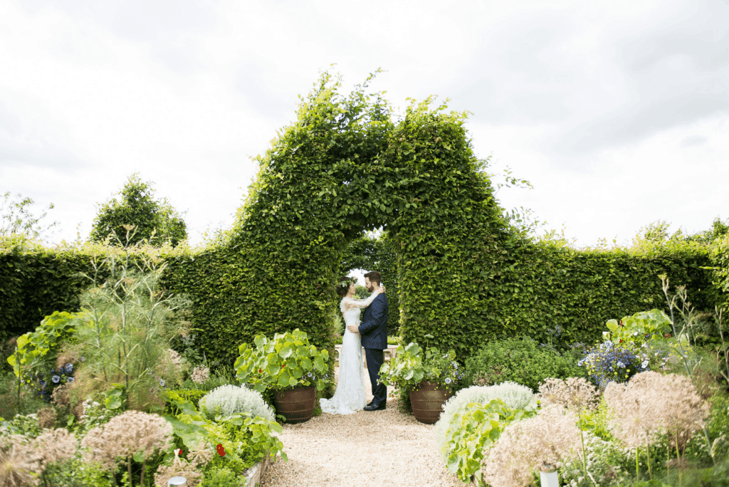 Wedding Couple in Herb Garden Cambridgeshire Farm Wedding