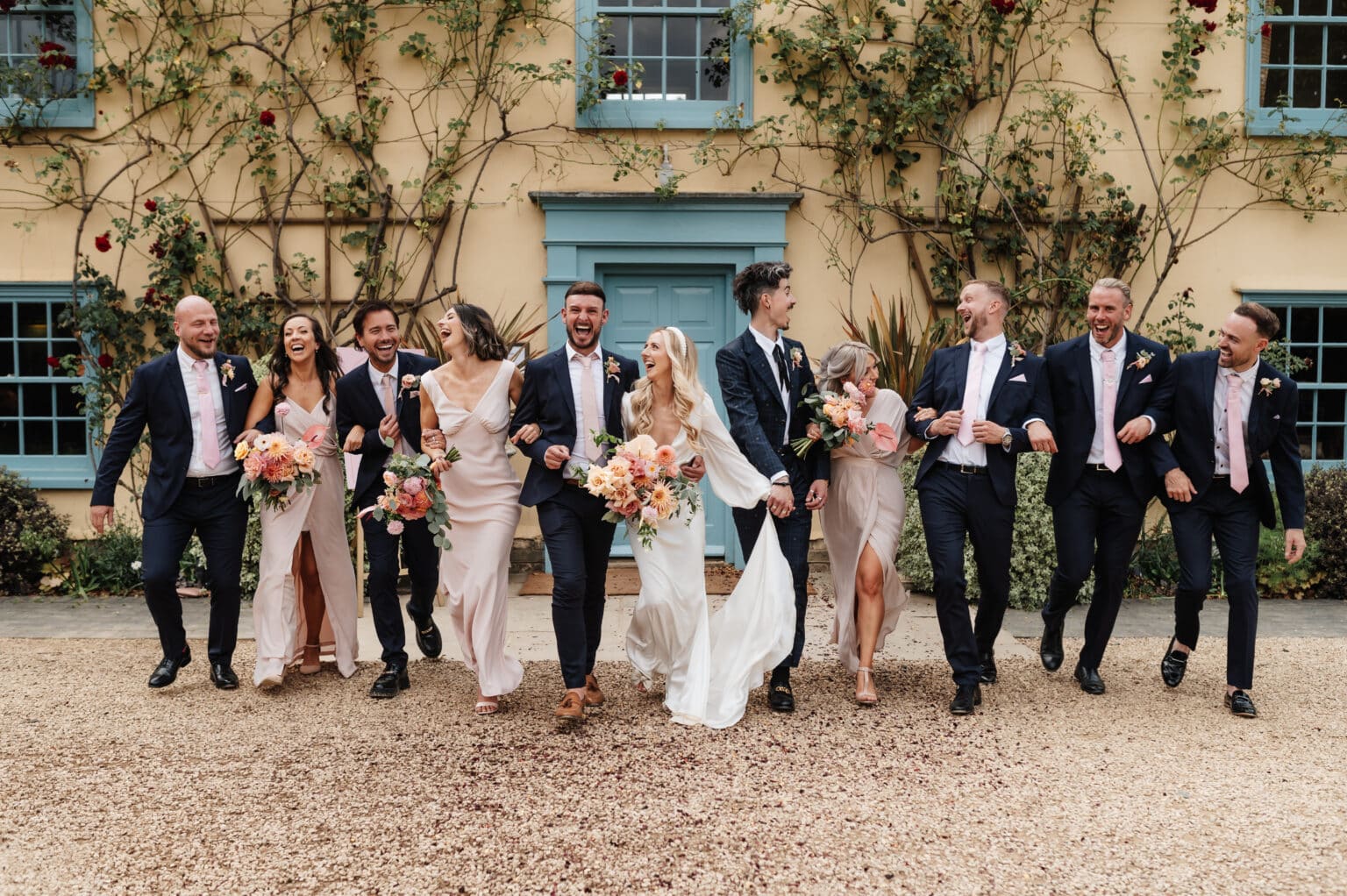 Bride, Groom and Bridal Party at Countryhouse wedding venue