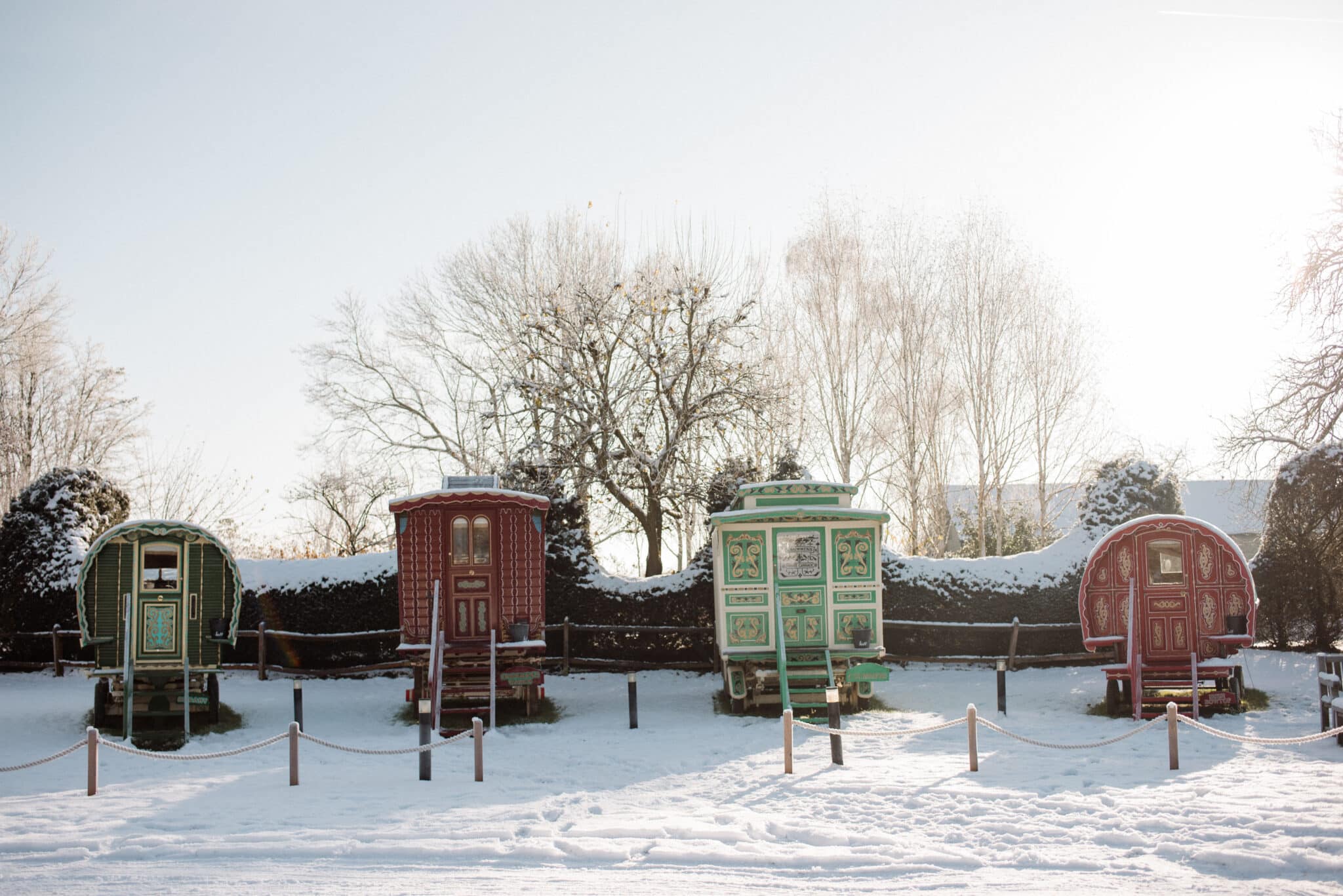 Romany wagon accommodation at winter wedding venue in snow