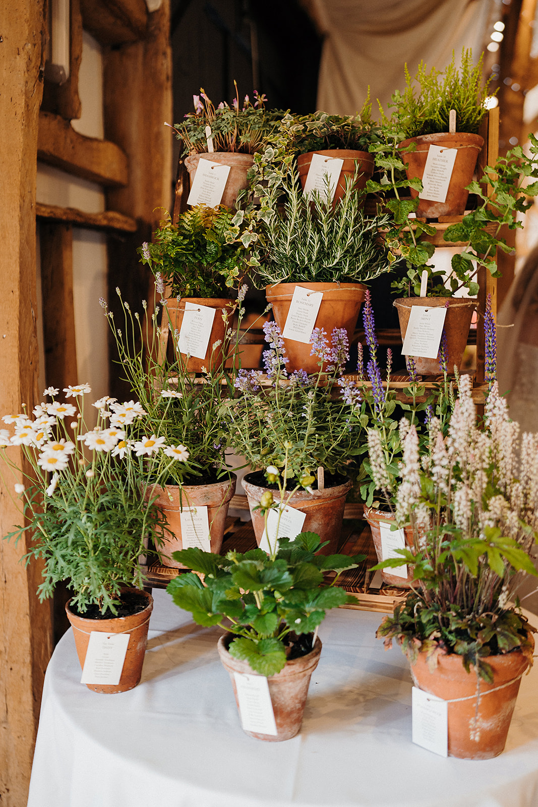 ECO FRIENDLY TABLE CENTREPIECES AT BARN WEDDING VENUE