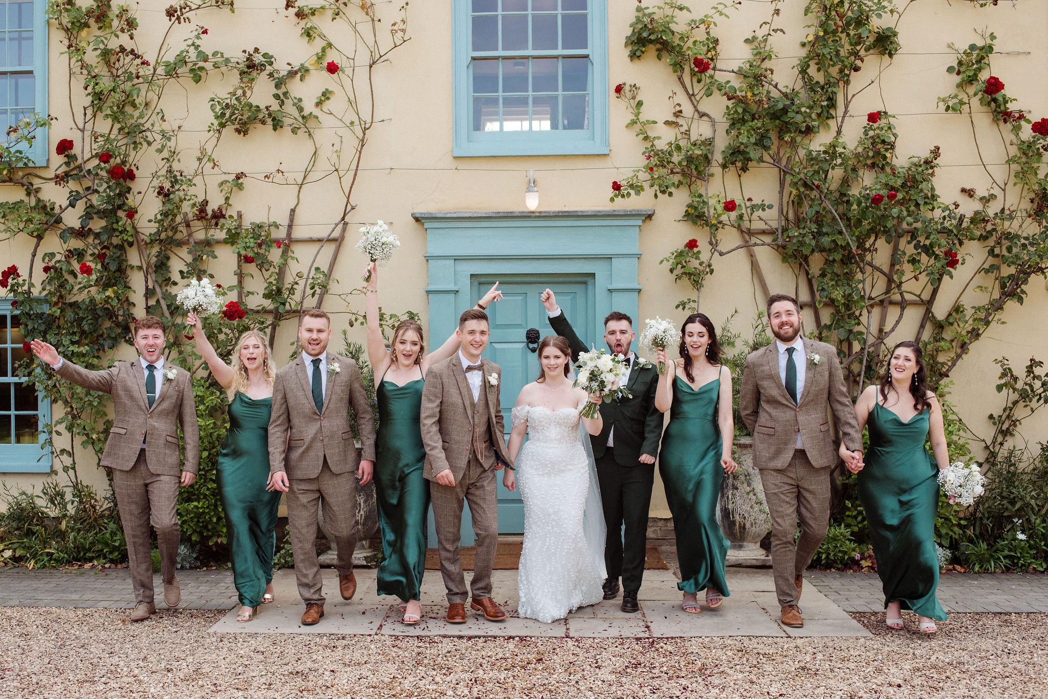Bride groom and bridesmaids at farmhouse wedding venue