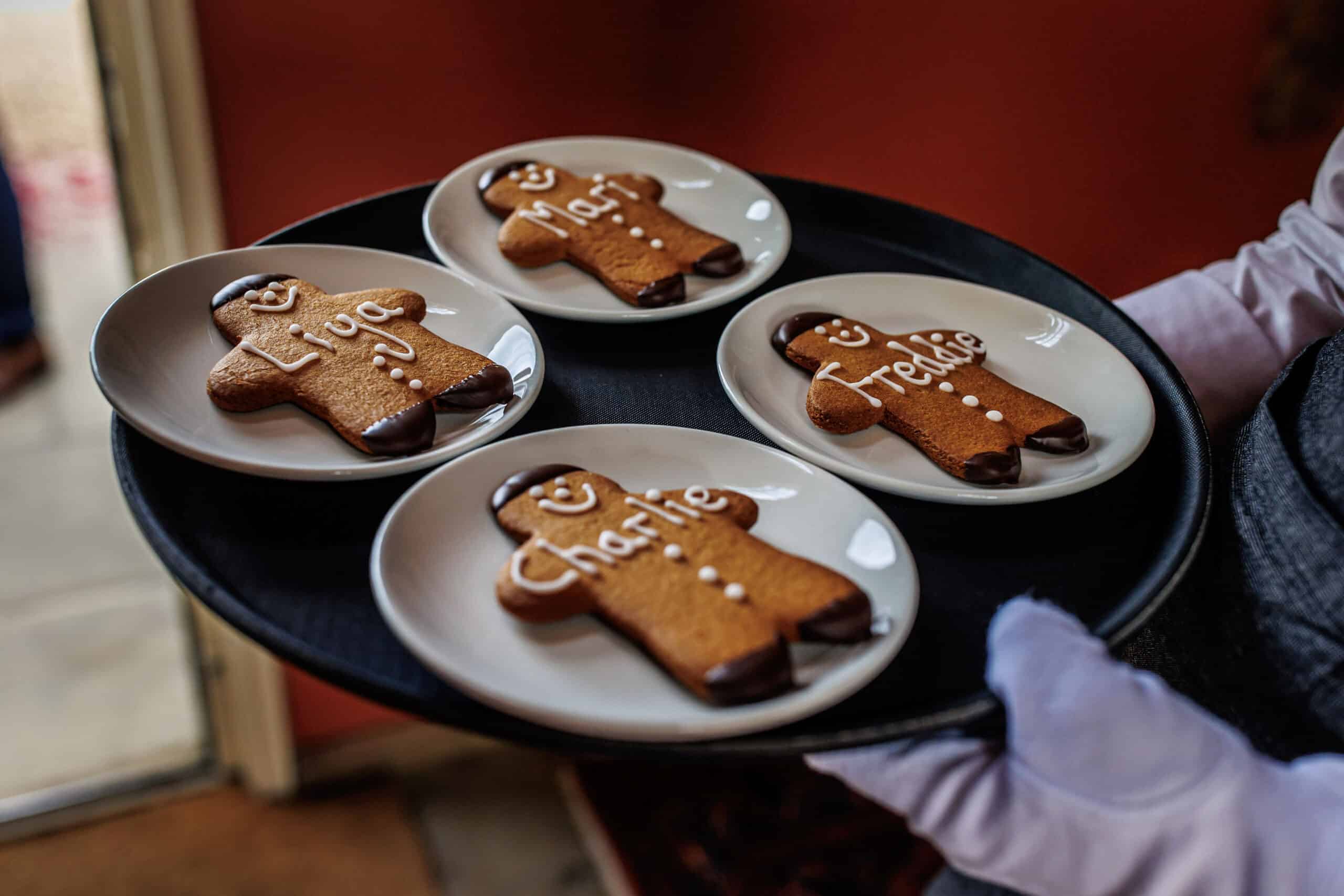 Gingerbread men with children's names at foodie wedding venue