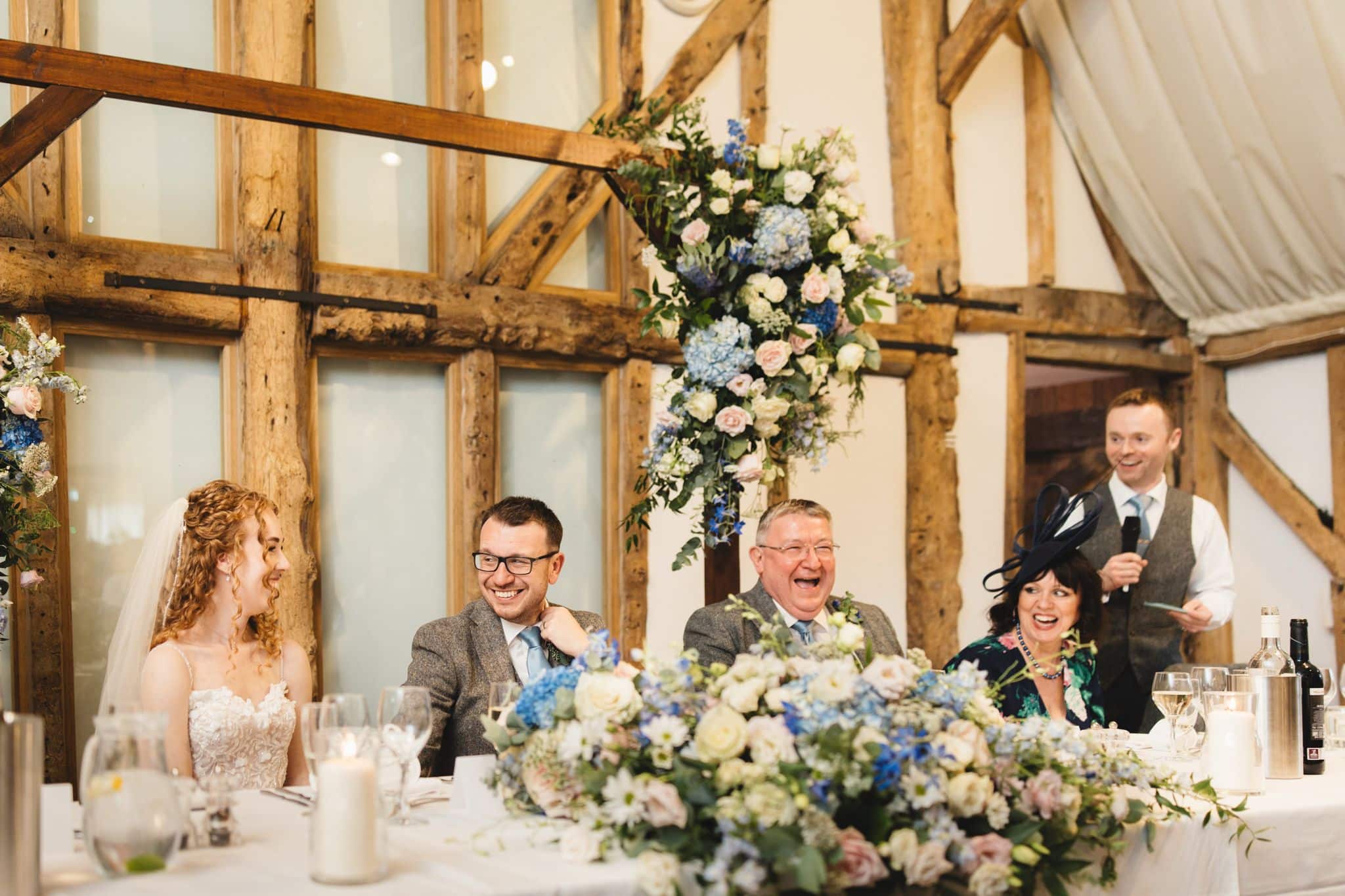The Best Man doing his speech in the charming Tudor Barn based at countryside wedding venue in Cambridgshire