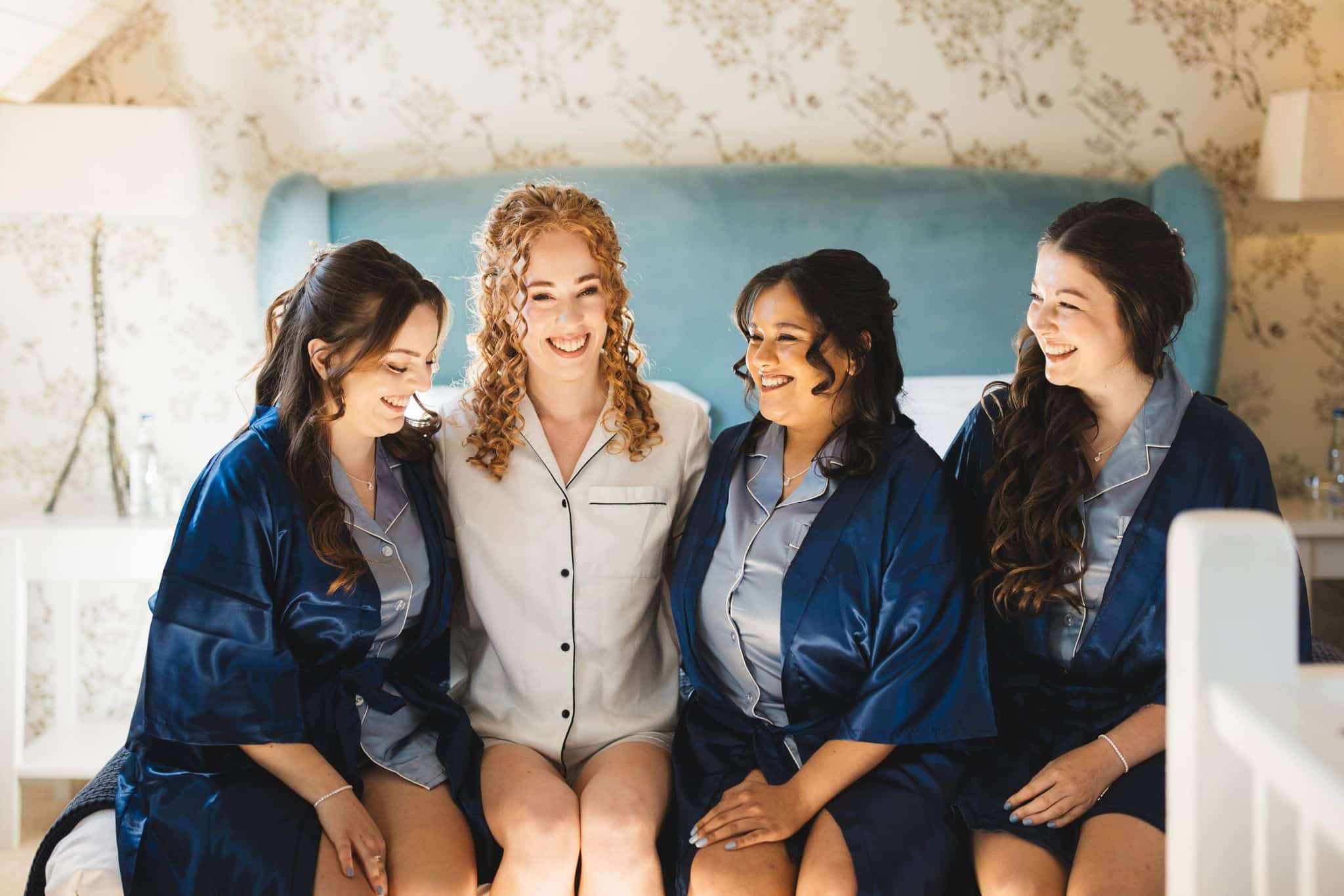 Bride and her bridesmaids in the Coach House getting ready and making final prep before the ceremony in the Old Dairy 