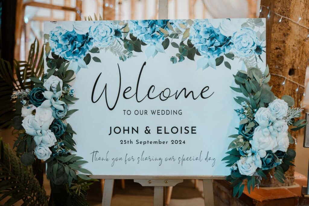 Blue floral Wedding Table Plan in the Tudor Barn