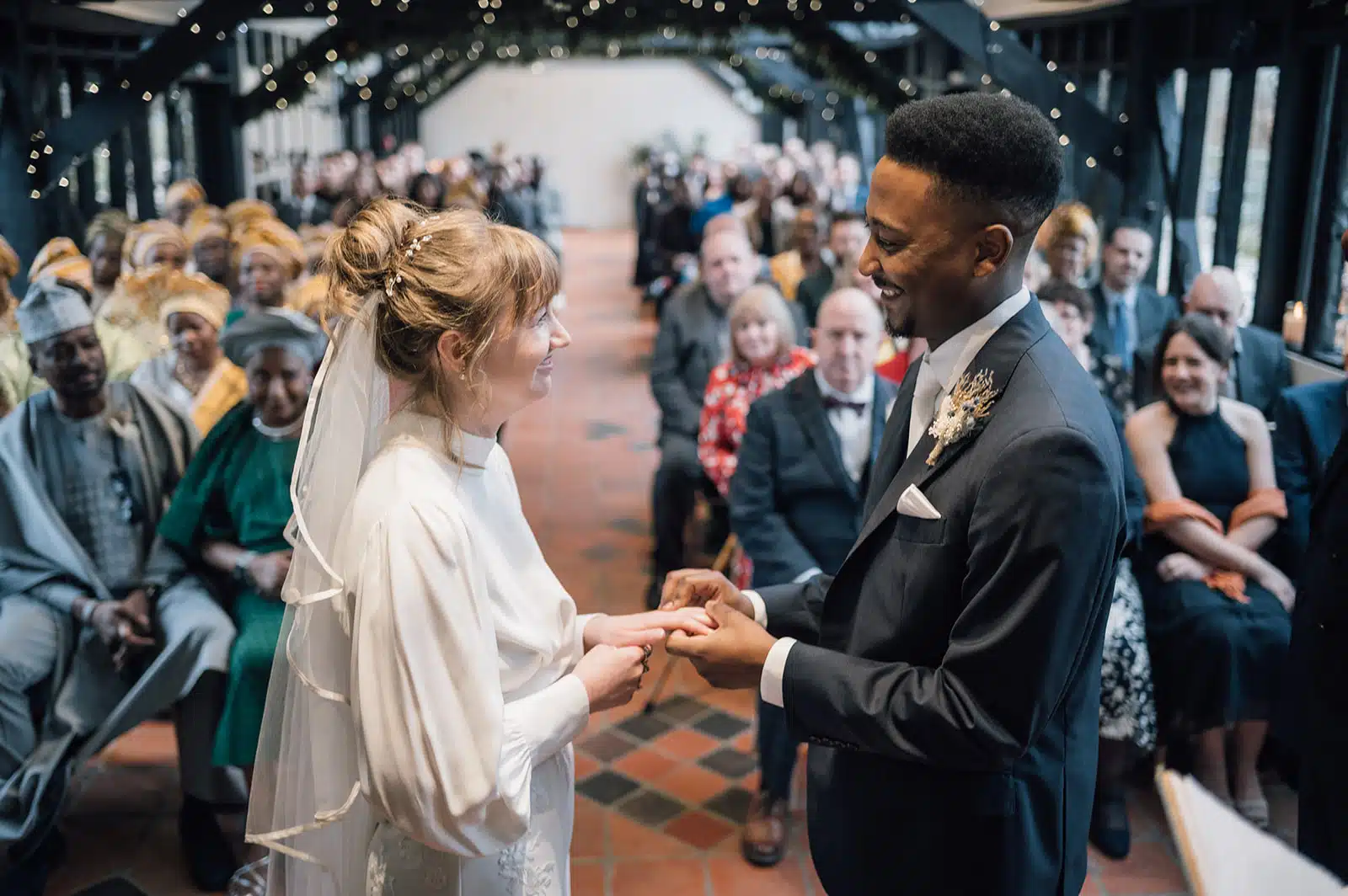 Bride and Groom in the Old Dairy sharing a special moment at barn style wedding venue