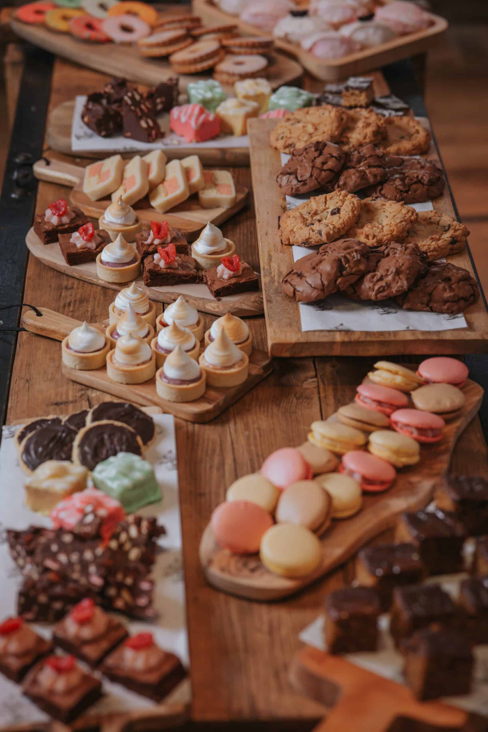 Wedding venue sweet treat cart display on vintage cart