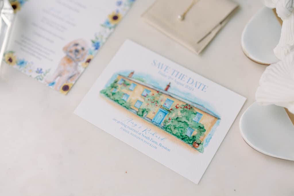 Sustainable wedding stationary on recycled paper with handdrawn picture of South Farm wedding venue