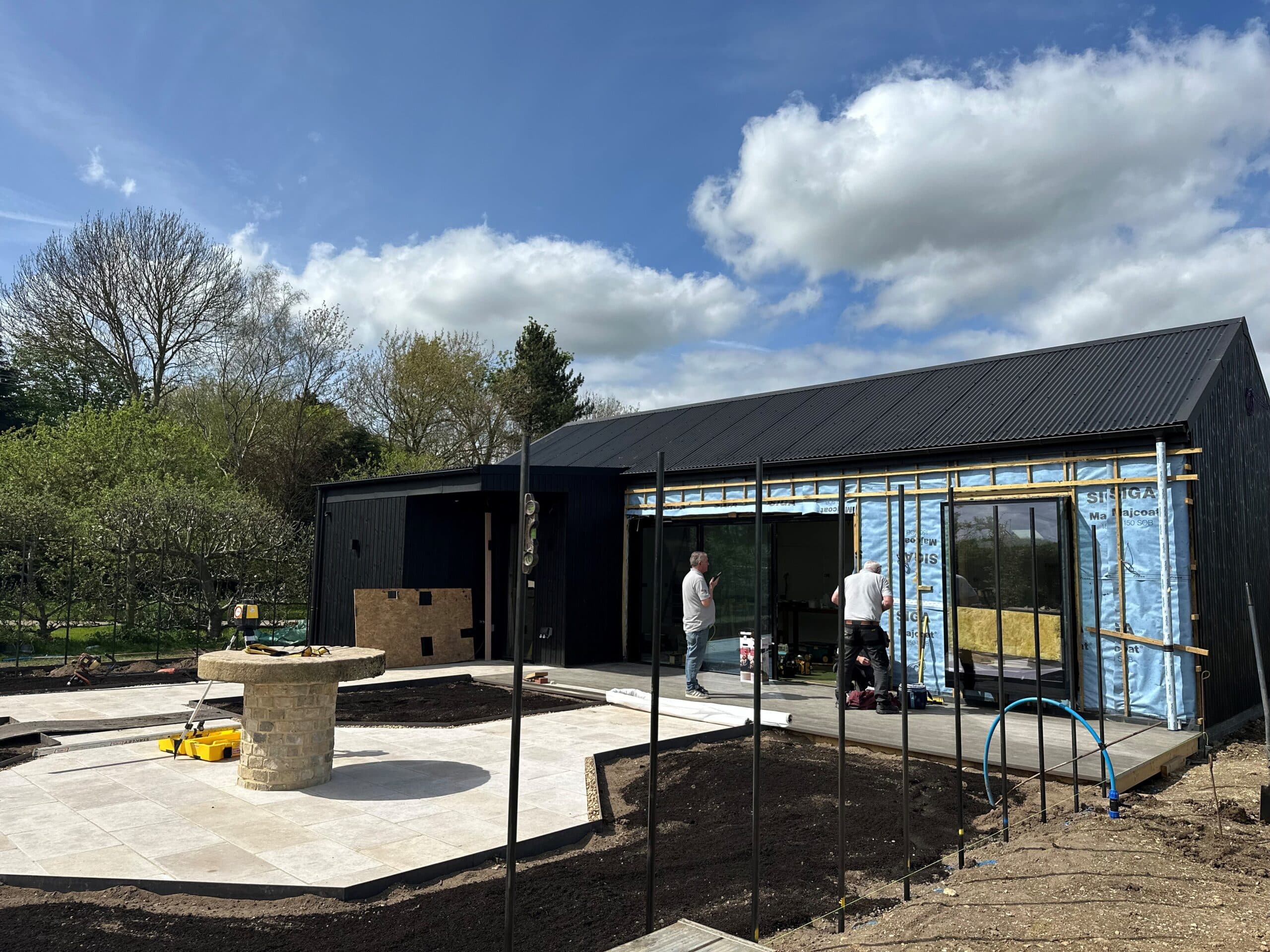 Modern house with garden under construction