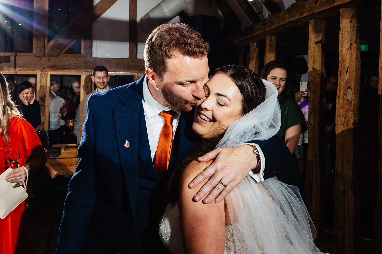 Couple celebrating at their wedding reception.