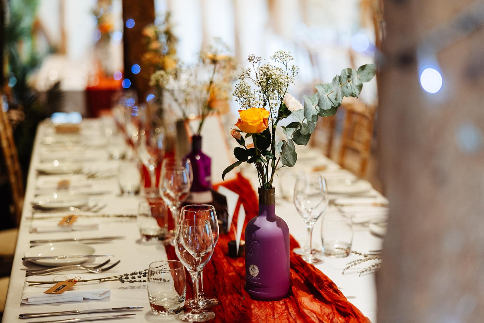Elegant wedding table setting with flowers.