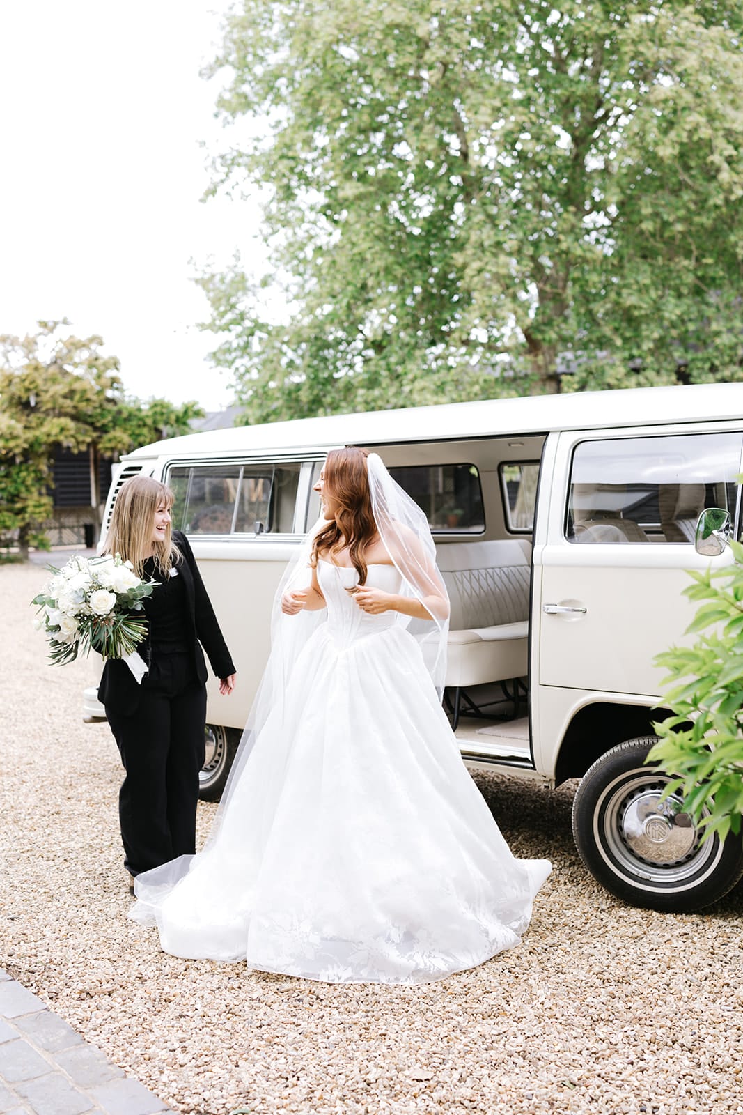 Bride and Event Manager standing next to Walter at front of charming farmhouse getting ready for the ceremony