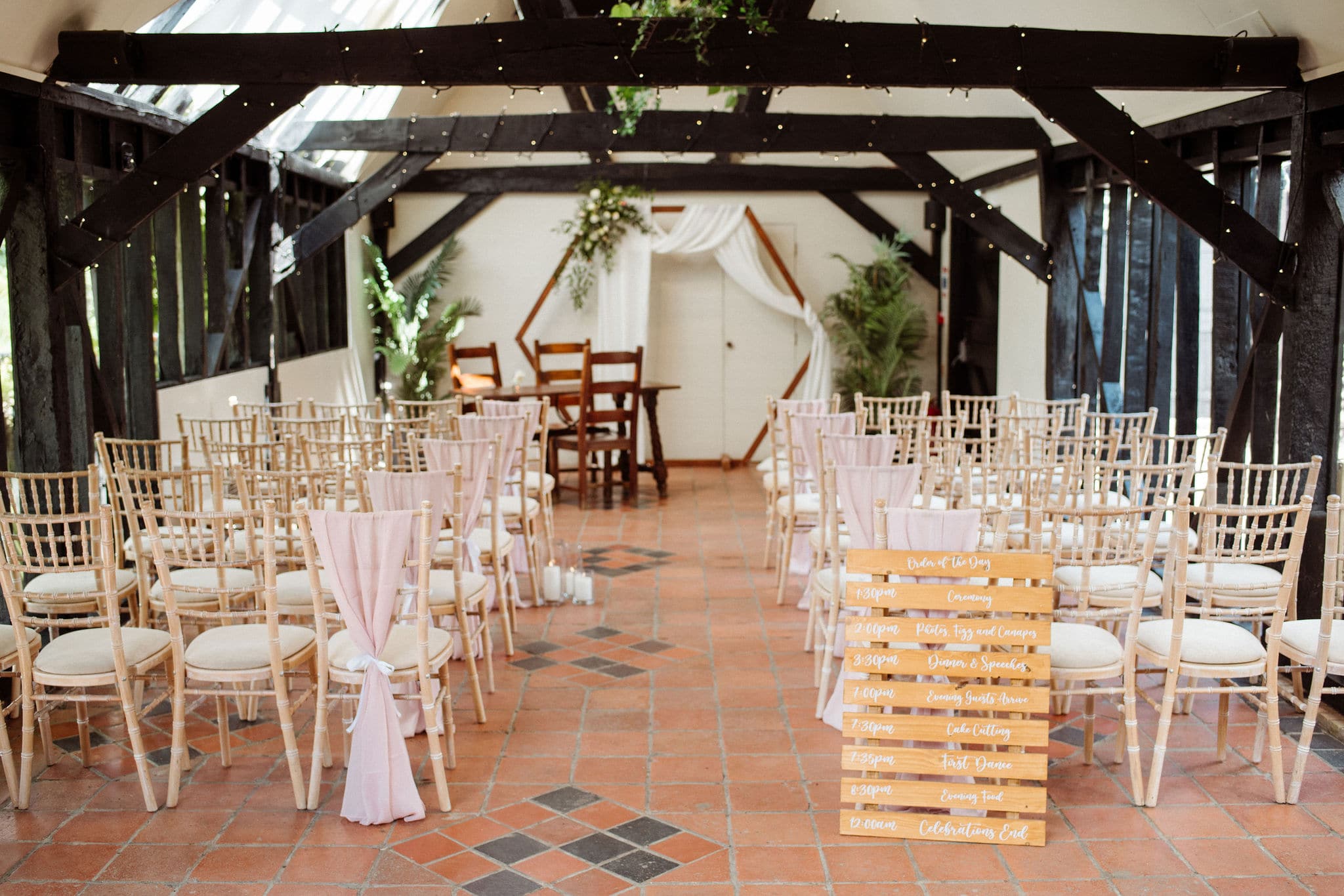 Small intimate ceremony in the Old Dairy at South Farm wedding venue