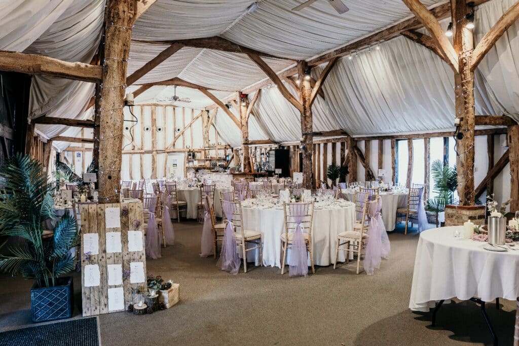 Beautiful rustic wedding barn set for dining