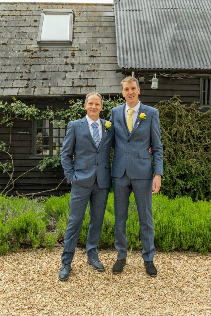 Groom and Best Man on wedding day at barn wedding venue