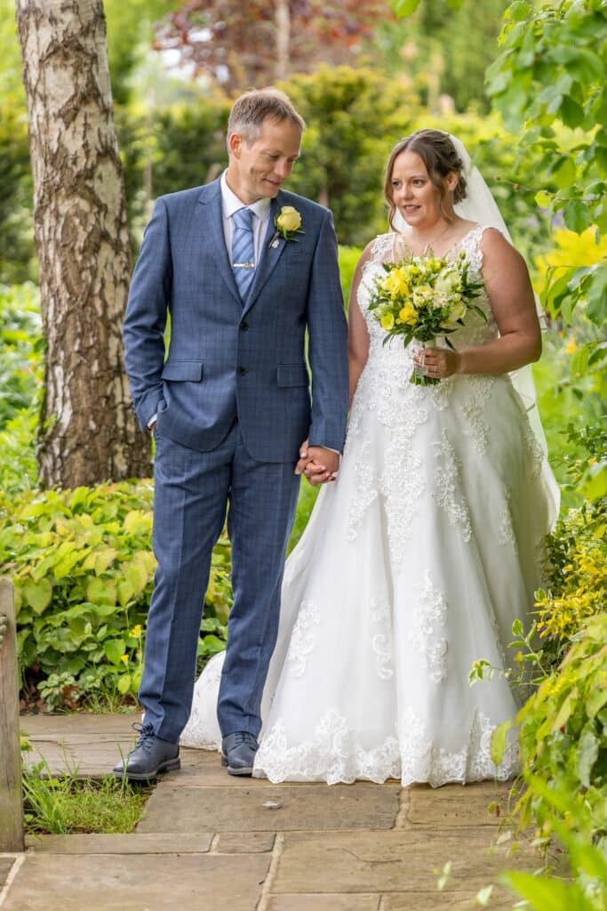 Bride and Groom in stunning countryside gardens on wedding day
